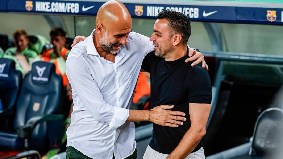 Guardiola y Xavi