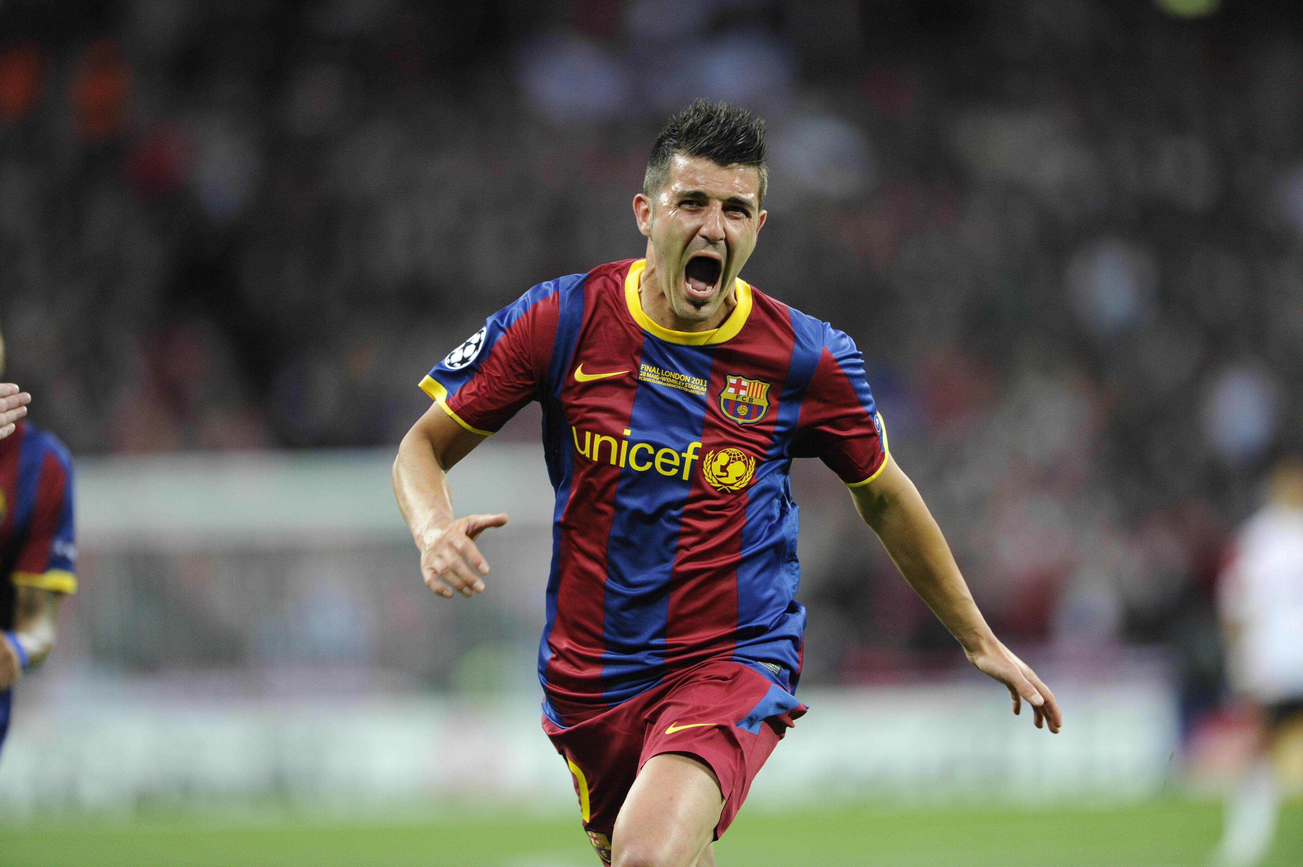 Villa celebrando un gol con el Barcelona